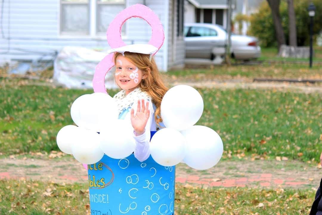 Children taking part in a grade school Halloween parade