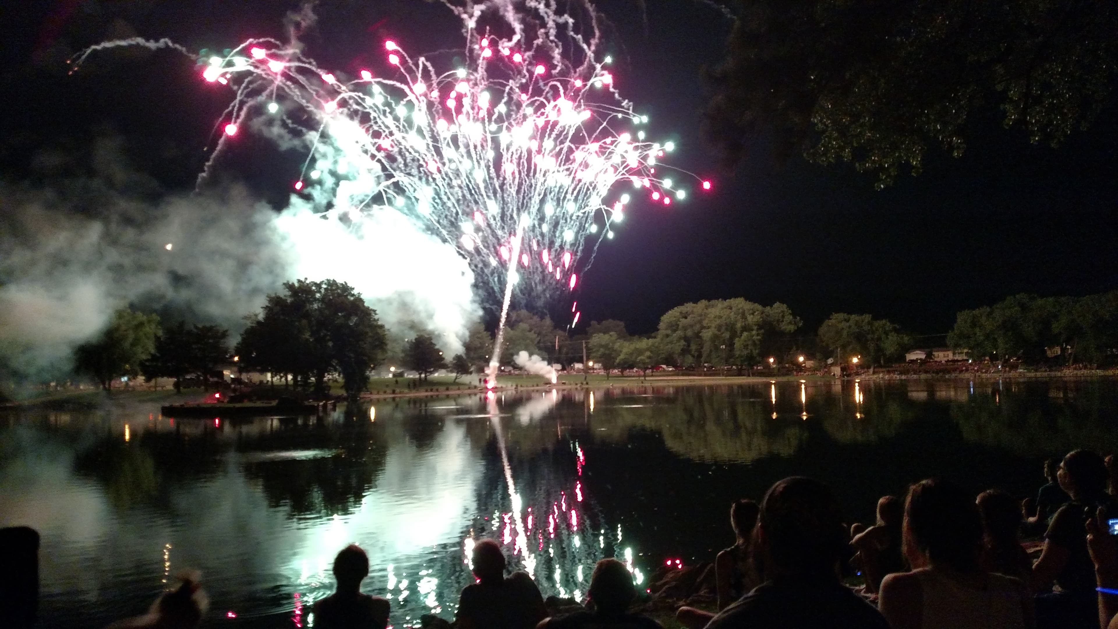 People watching fireworks outdoors in Sterling